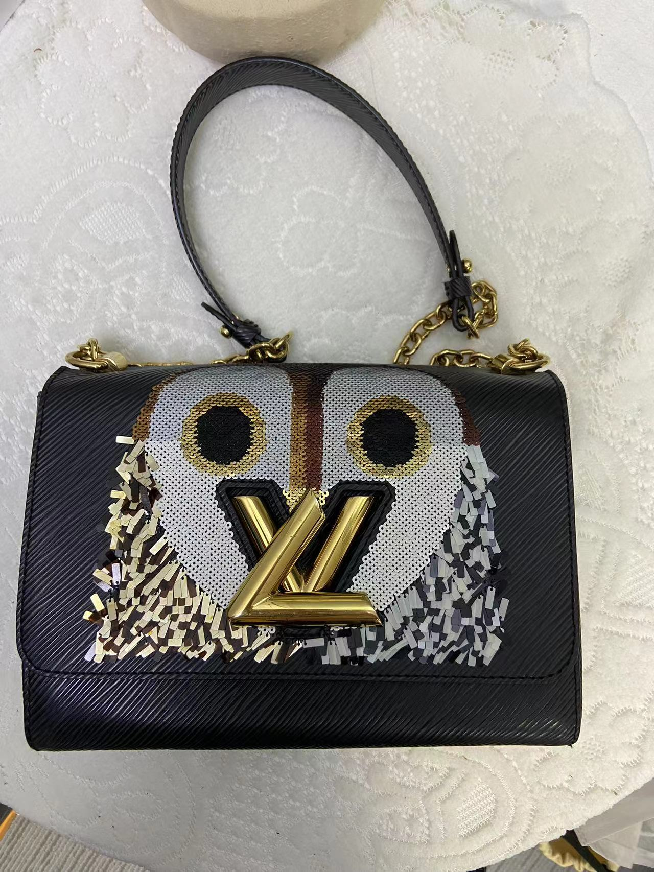 LOUIS VUITTON owl twist handbag